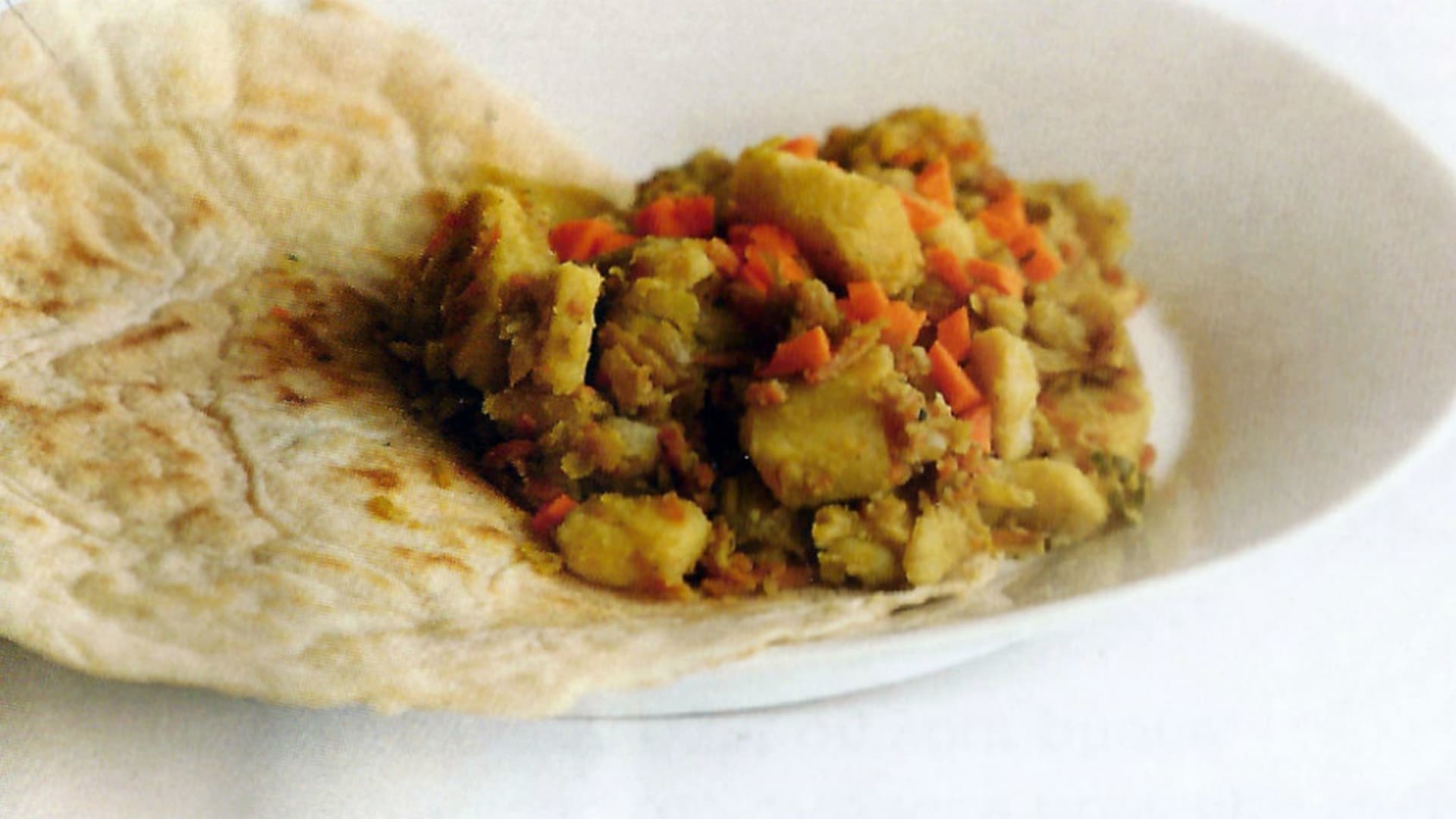 Injera With Atkilt Wat (Cabbage & Crepes)